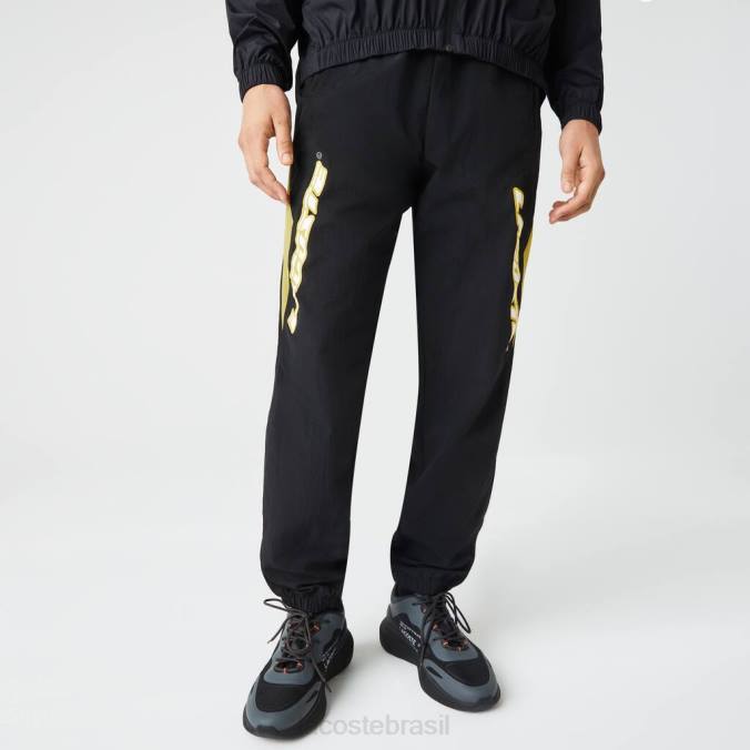 Lacoste homens calça esportiva color block de ajuste regular Heritage Preto amarelo P2PX1110 roupas