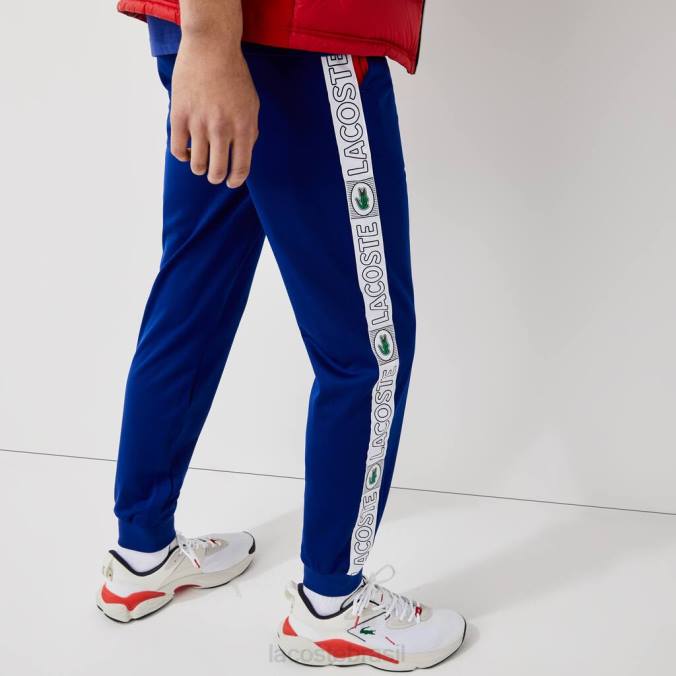 Lacoste homens calças de treino com faixas de marca esportiva azul/vermelho/branco P2PX1119 roupas