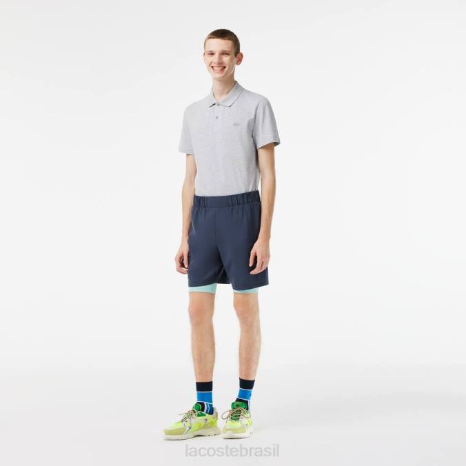 Lacoste homens shorts esportivos bicolores com cuecas embutidas azul/verde claro P2PX480 roupas