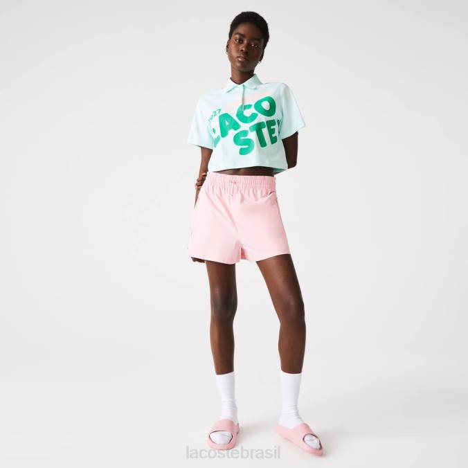 Lacoste mulheres Polo de algodão orgânico com estampa curta e folgada turquesa P2PX2526 roupas
